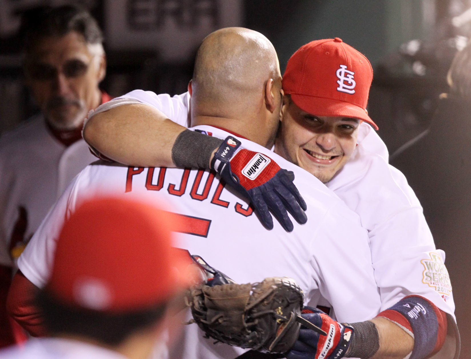 A hug between Yadier Molina and Albert Pujols after 2011 World Series Game 6